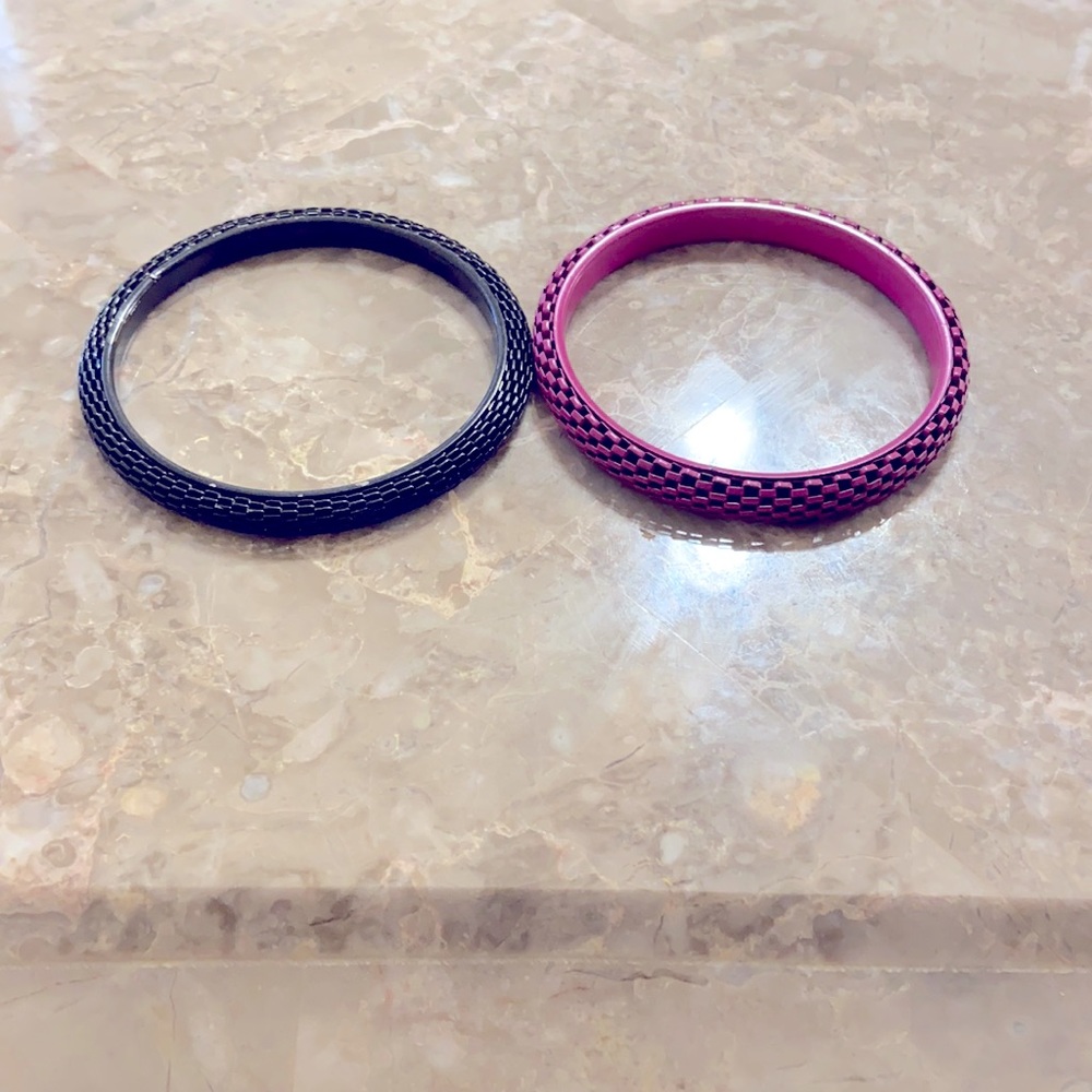 Variety of bracelets and feathered earrings